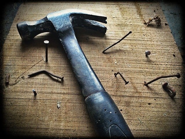 hammer and nails - diy project gone wrong trying to save money